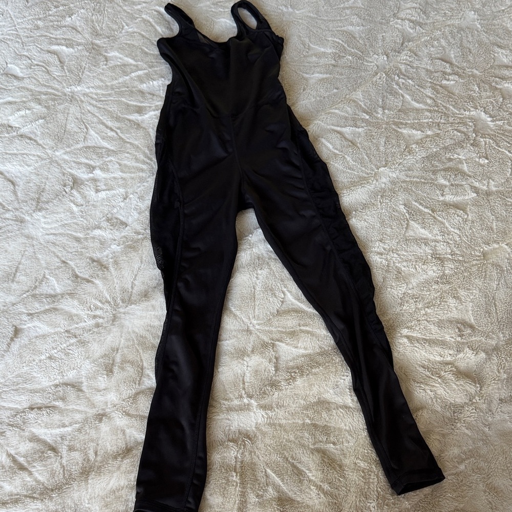 Elegant Black Sleeveless Jumpsuit transparency in the legs excellent condition